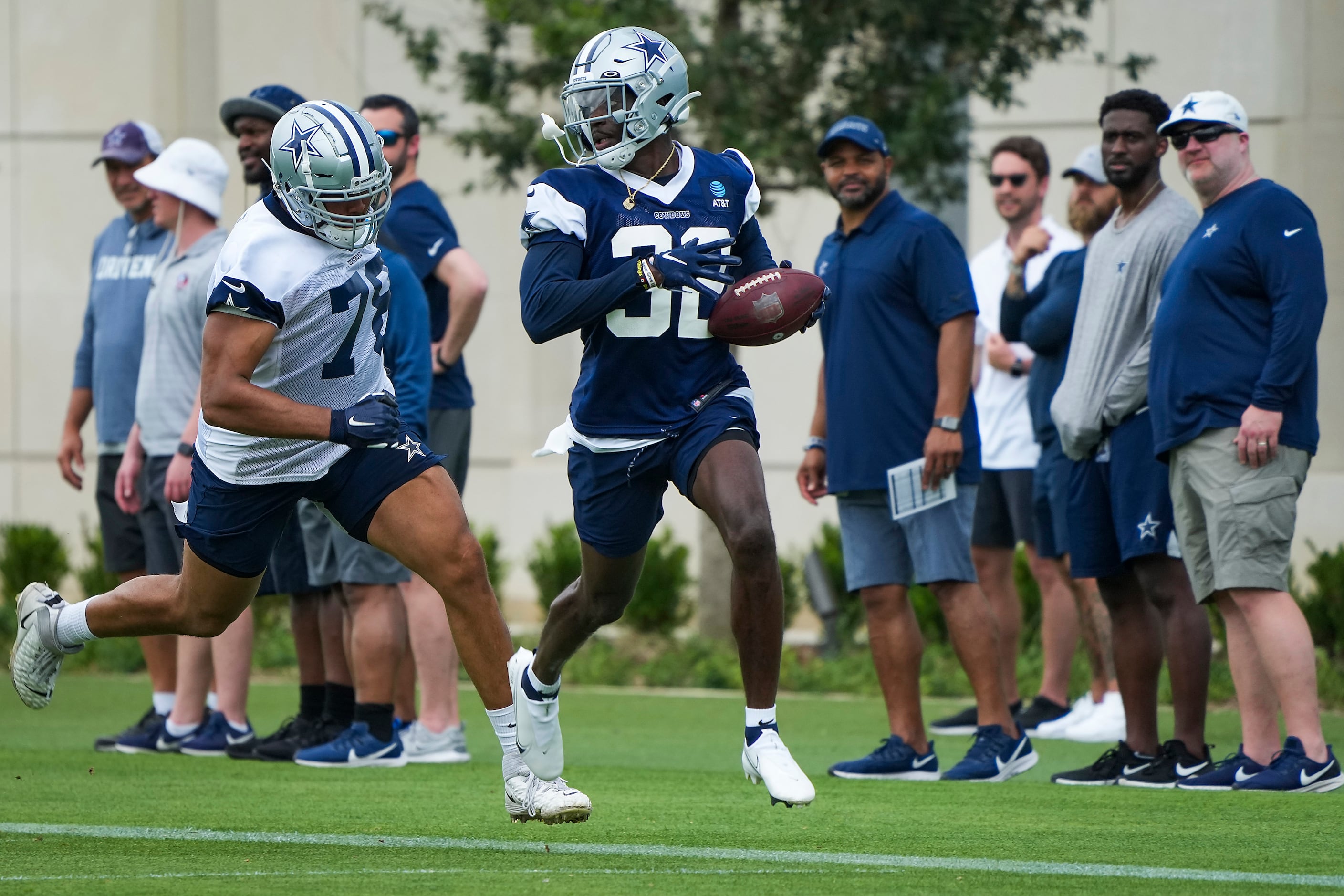 Dallas Cowboys safety Jayron Kearse (32) races past tackle Terence Steele (78) with a...