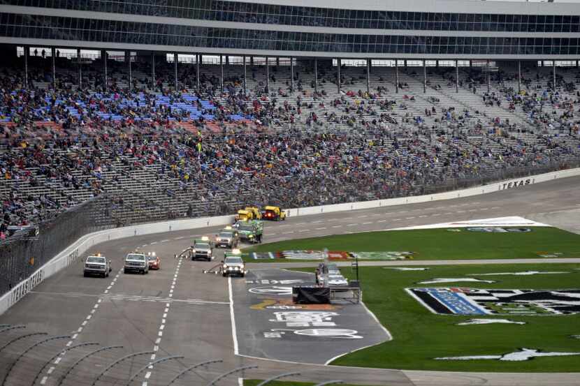 Apr 6, 2014; Fort Worth, TX, USA; NASCAR Sprint Cup Series air titan track dryers on the...