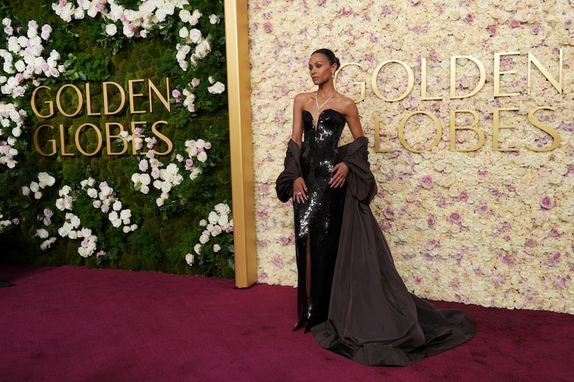 Zoe Saldana arrives at the 82nd Golden Globes on Sunday, Jan. 5, 2025, at the Beverly Hilton...