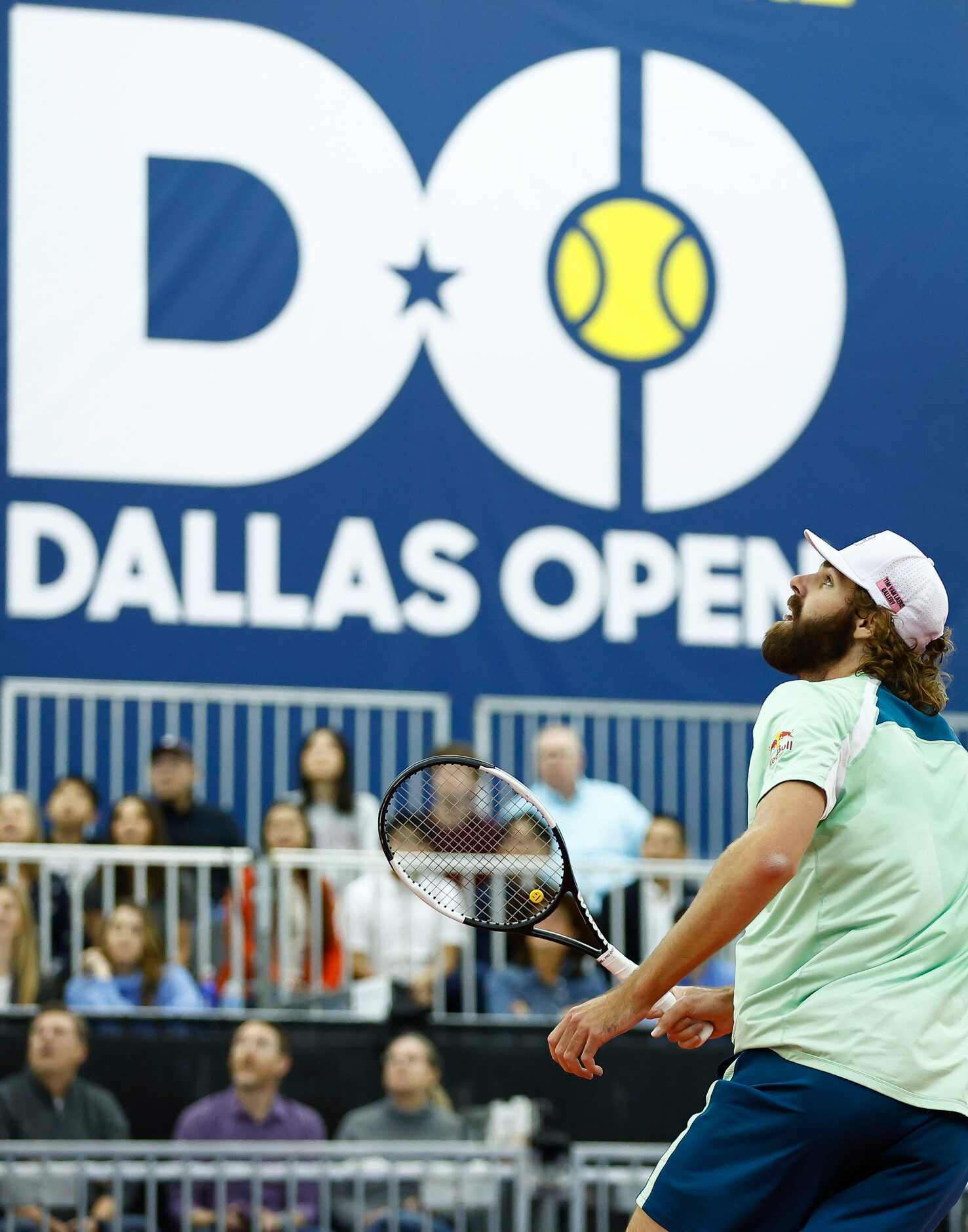 Reilly Opelka returns the ball during the finals ATP Dallas Open against Jenson Brooksby at...