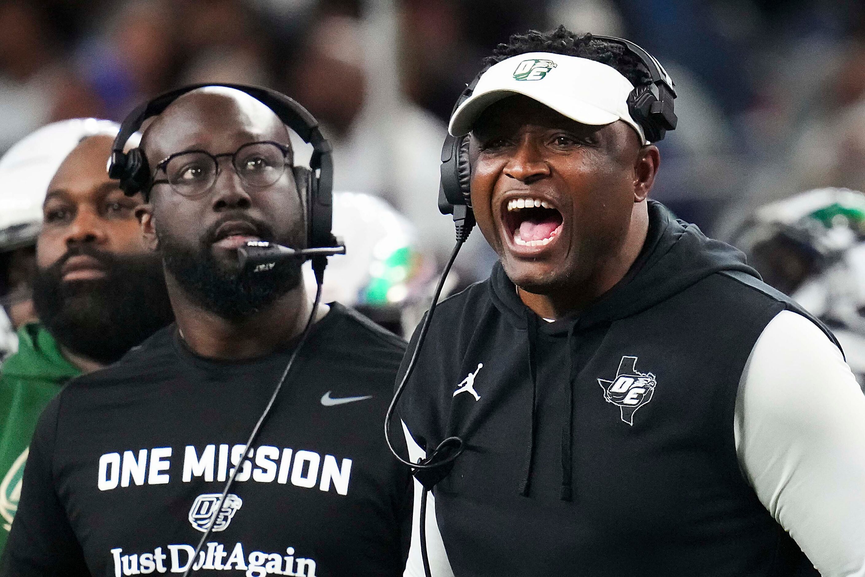 DeSoto head coach Claude Mathis yells to his team during the first half of the Class 6A...