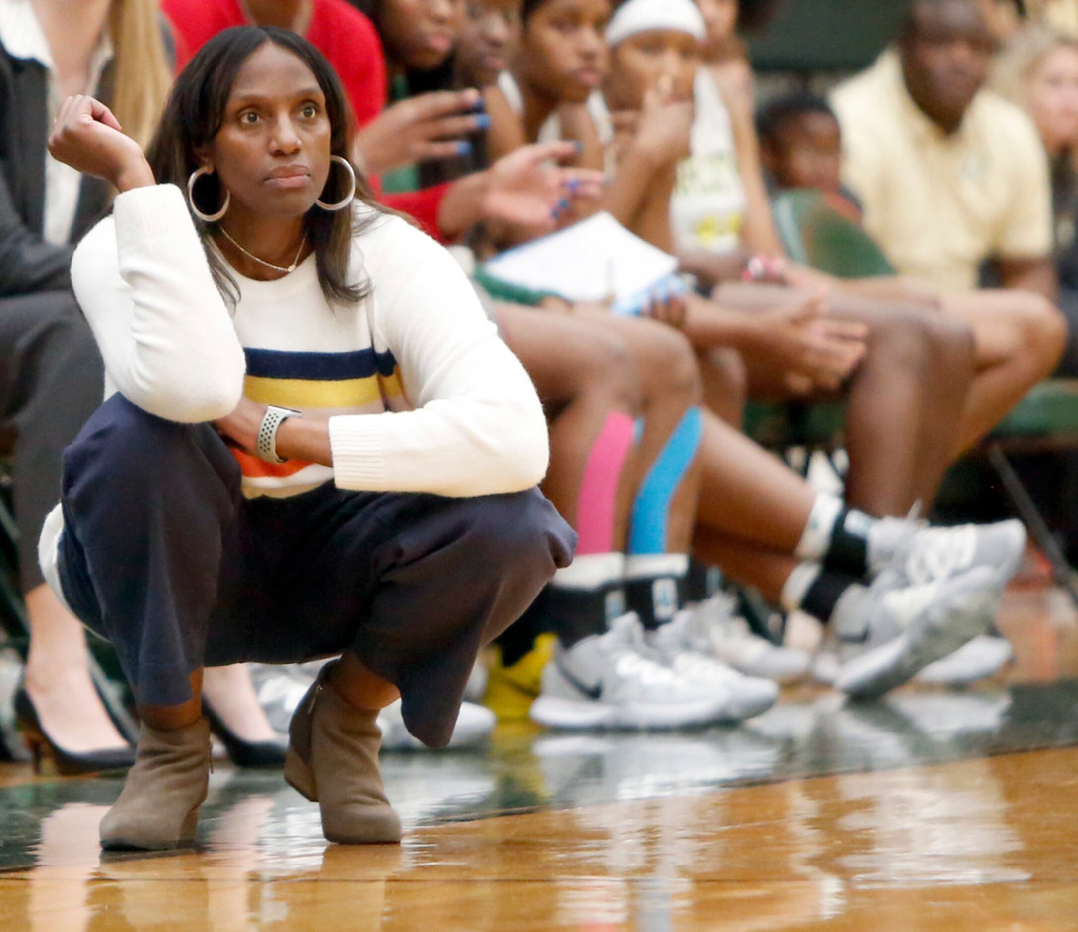 DeSoto head coach Andrea Robinson watches her team during fourth quarter action against...