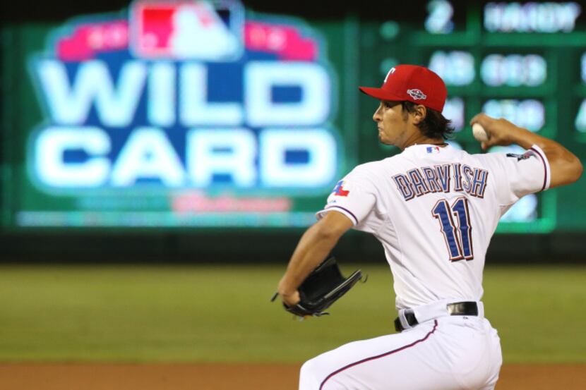 Texas Rangers starting pitcher Yu Darvish (11) pitches against the Baltimore Orioles during...