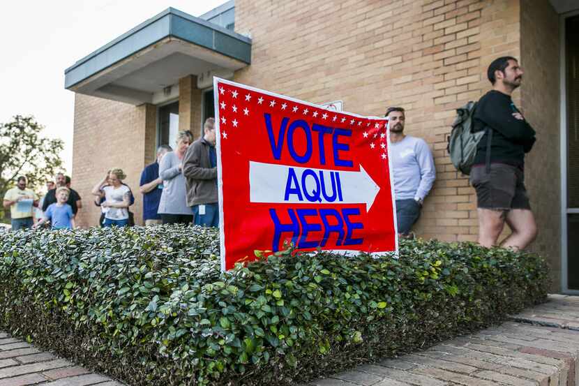 AUSTIN, TX - MARCH 06: A line of early voters wait outside the Gardner Betts Annex on March...