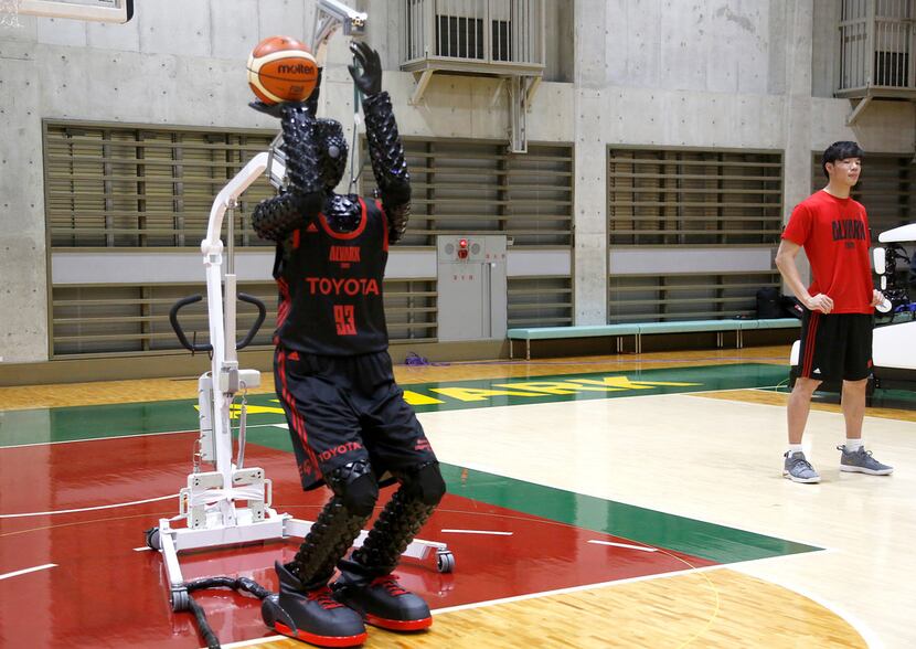 Toyotaâs basketball robot Cue 3 demonstrates Monday, April 1, 2019 at a gymnasium in...