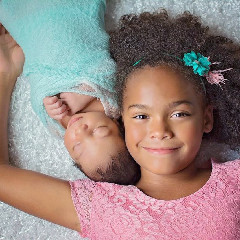 
Ally Nuncio and her brother, Peyton, as an infant.
