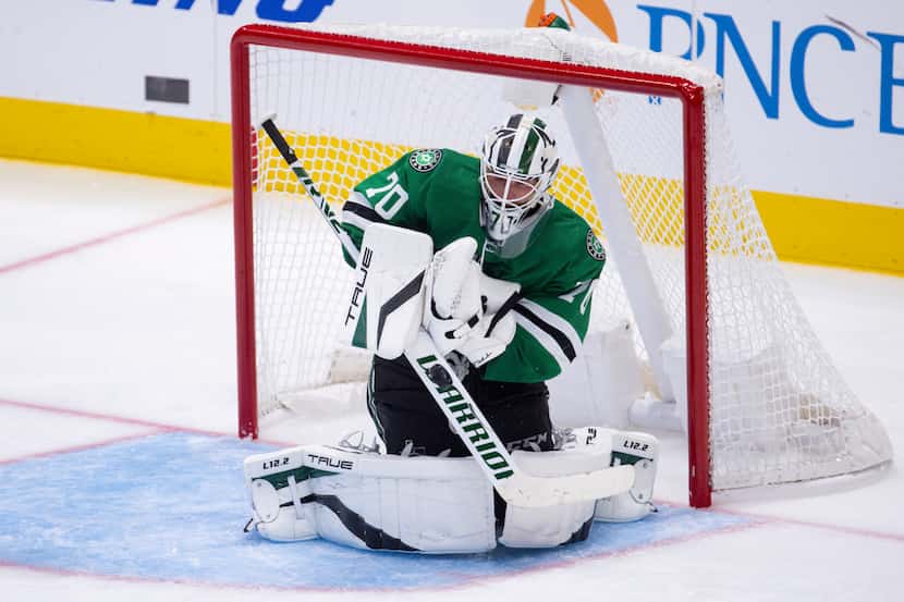 Dallas Stars goaltender Braden Holtby (70) stops a St. Louis Blues goal during the third...