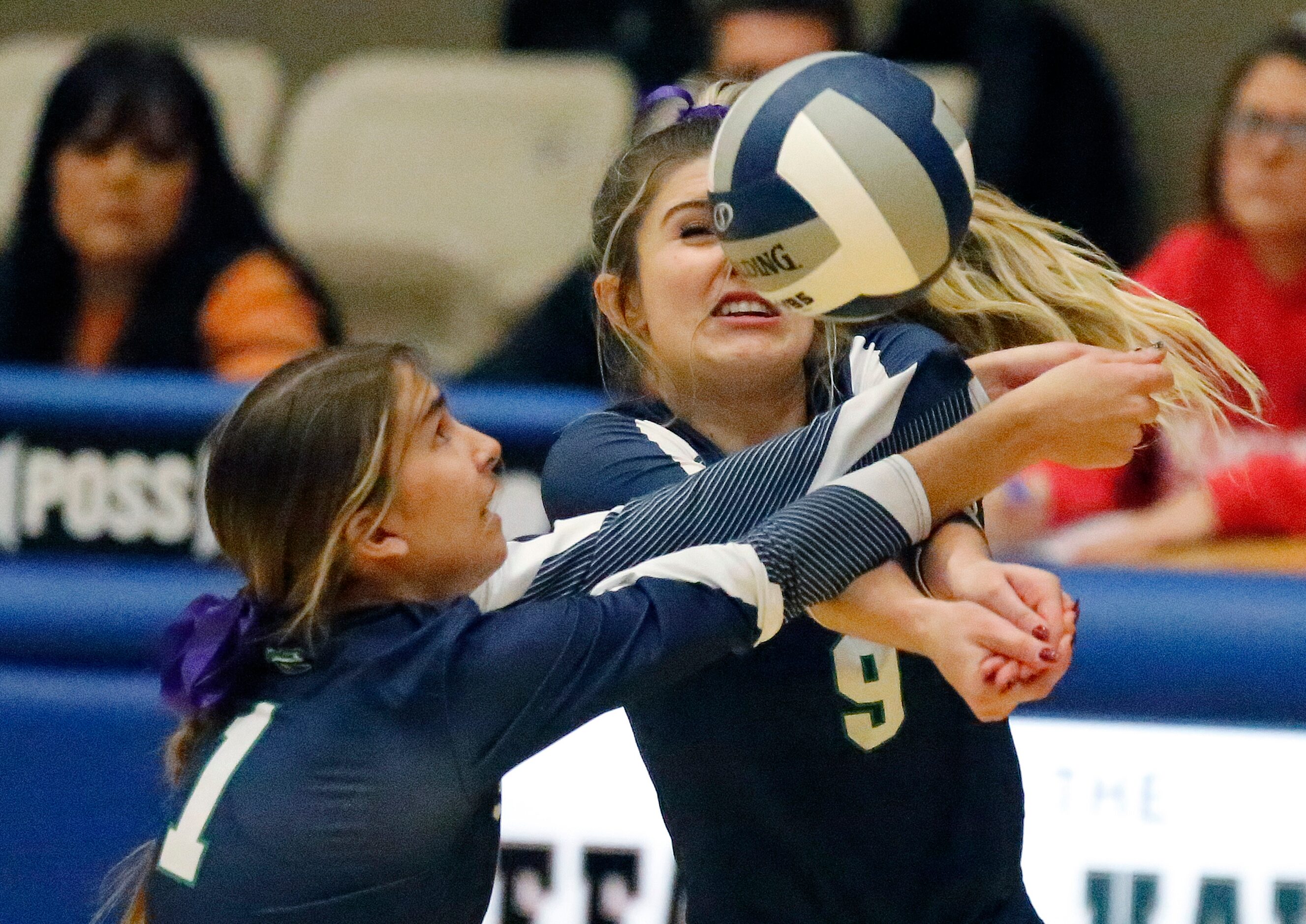 V.R. Eaton High School setter Keely Shearer (1) and V.R. Eaton High School outside hitter...