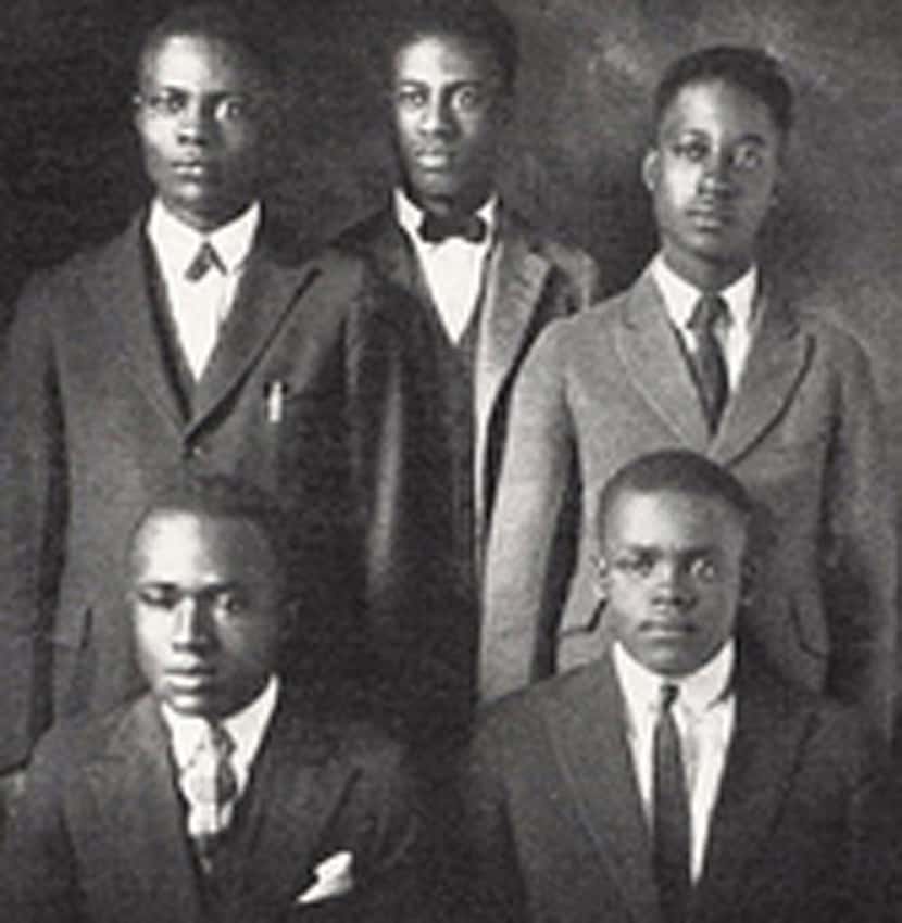 This photo shows Melvin B. Tolson (center) and members of the 1935 Wiley College debate team...