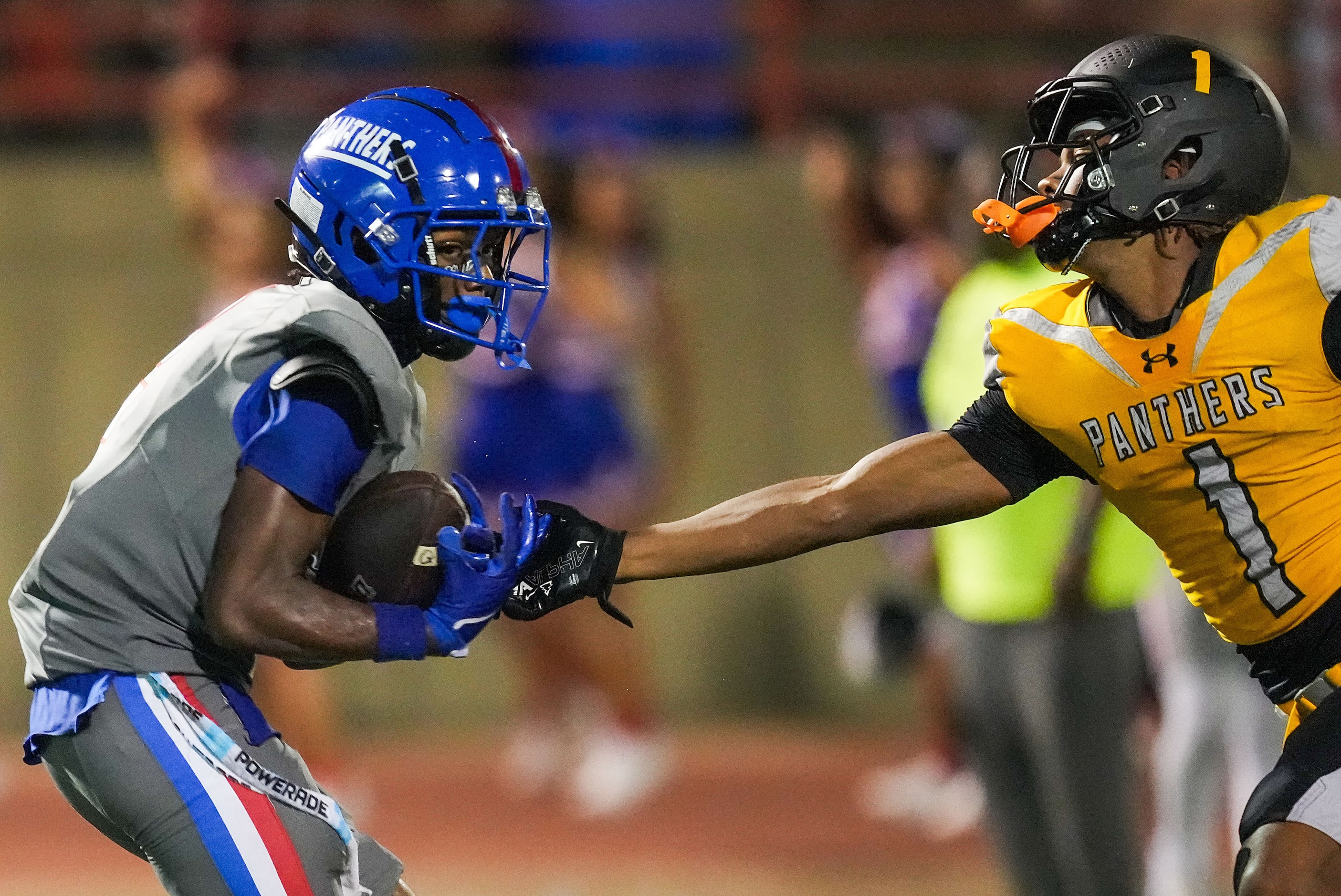 Duncanville wide receiver Ayson Theus (2) hauls in a 60-yard touchdown pass as St. Frances...