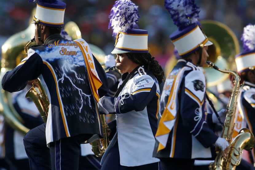Members of the Prairie View marching band perform at halftime of the Grambling State versus...