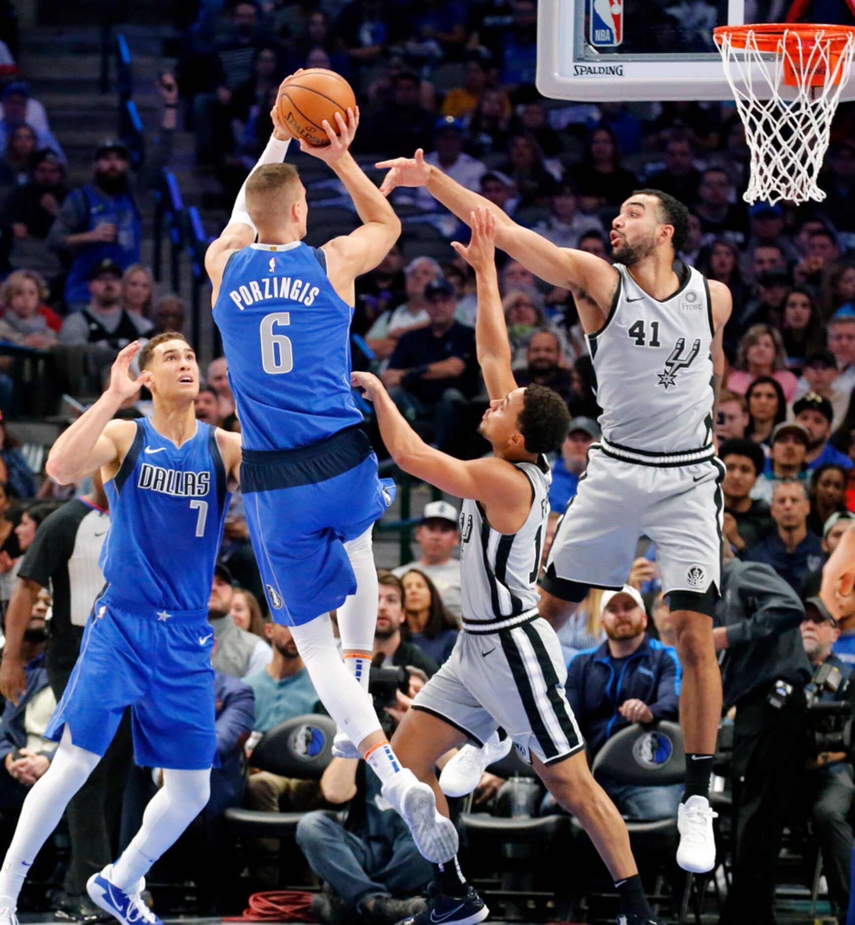 Dallas Mavericks forward Kristaps Porzingis (6) puts up a shot over San Antonio Spurs...