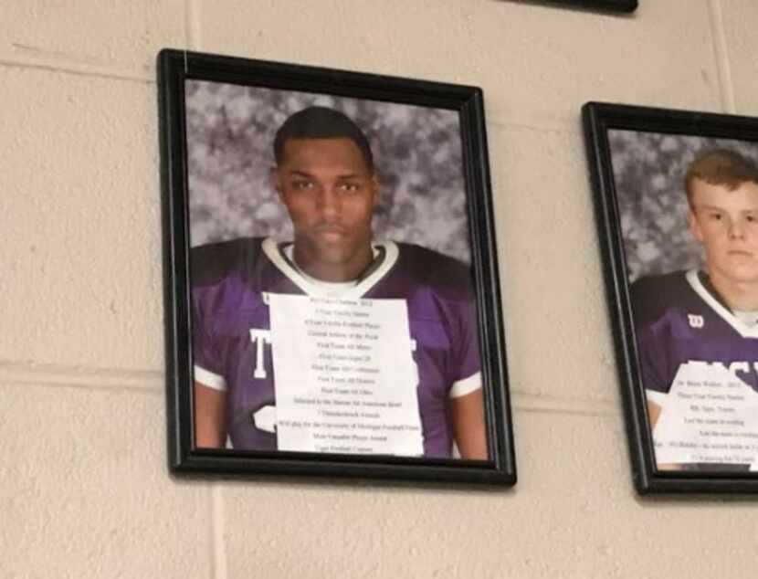 A picture of Taco Charlton, the Cowboys' first-round draft pick, hangs on the wall in the...