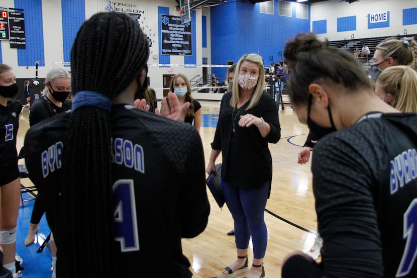 Trophy Club Byron Nelson coach Brianne Barker-Groth talks to her team during a match against...