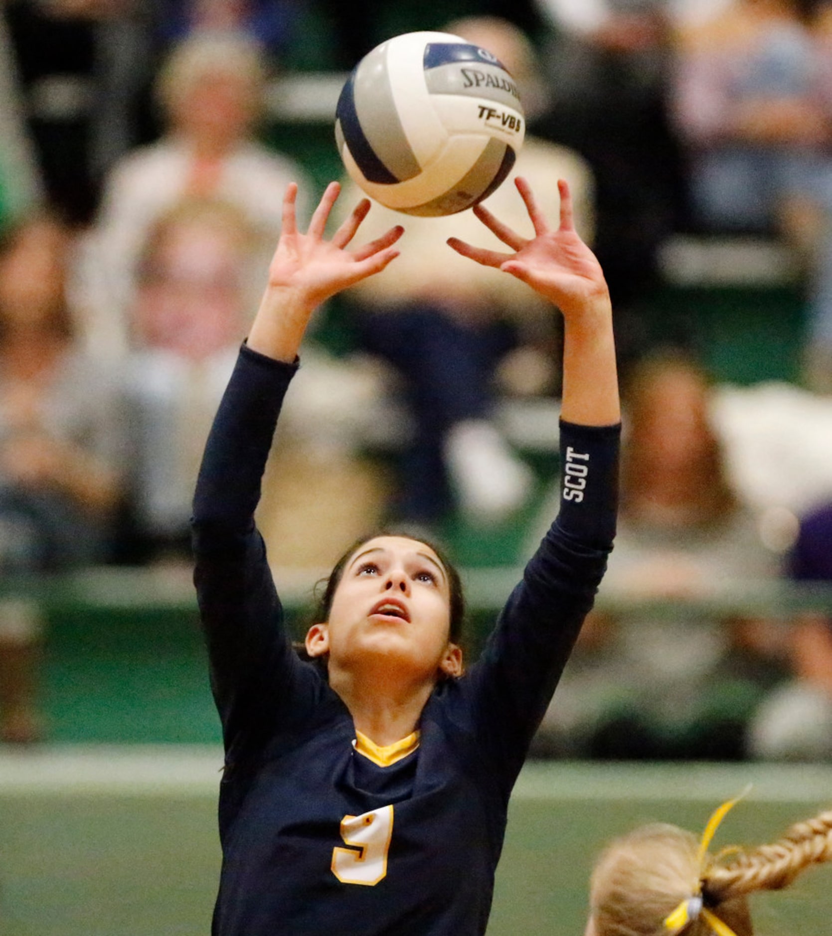 Highland Park High School setter Grace Braner (9) makes a set during game two as Lebanon...