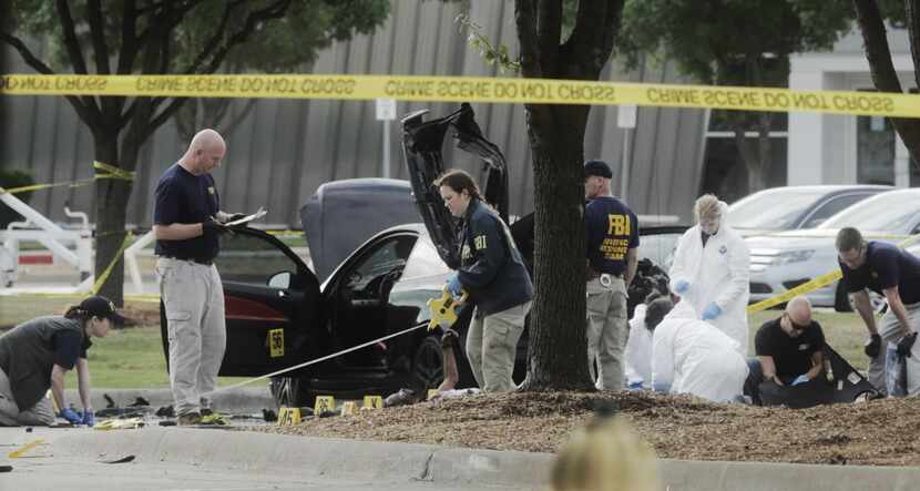  The FBI and Garland Police investigate the scene of a shooting Monday May 4, 2015 at the...