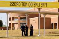 Mansfield ISD police officers outside Mansfield Timberview High School in Arlington on Oct....