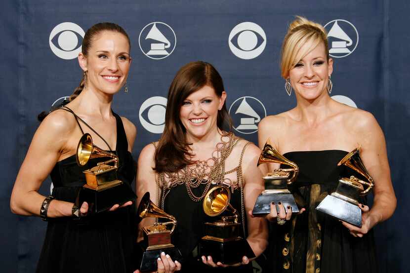 The Chicks pose with their Grammy awards Feb. 11, 2007. The 13-time Grammy-award winning...