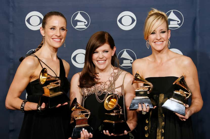 In this Feb. 11, 2007 file photo, musicians Emily Robison, left, Natalie Maines, center, and...