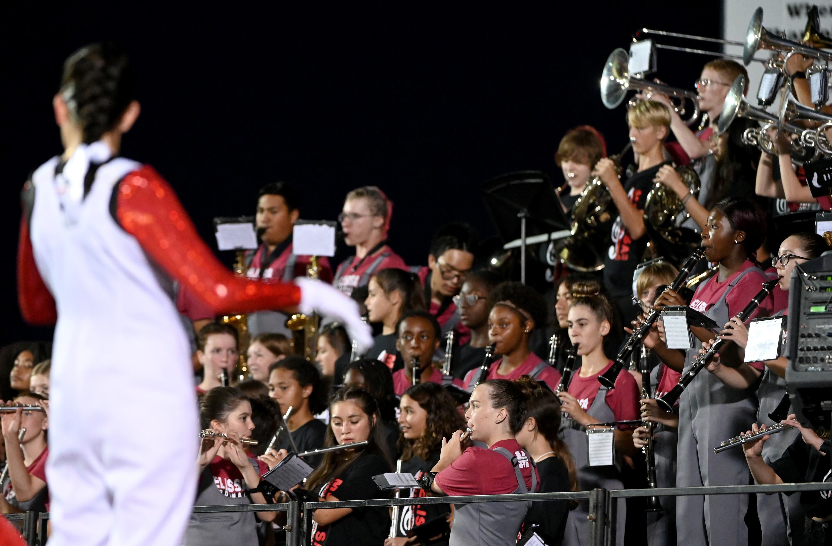 The Melissa band performs in the first half of a high school football game between Argyle...