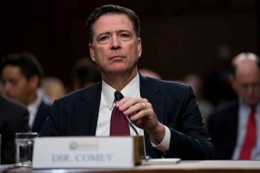 Former FBI Director James Comey testifies during a Senate Intelligence Committee hearing on...