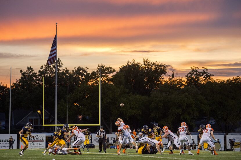 Rockwall senior quarterback Matt Jones (16) throws a pass against Highland Park during the...