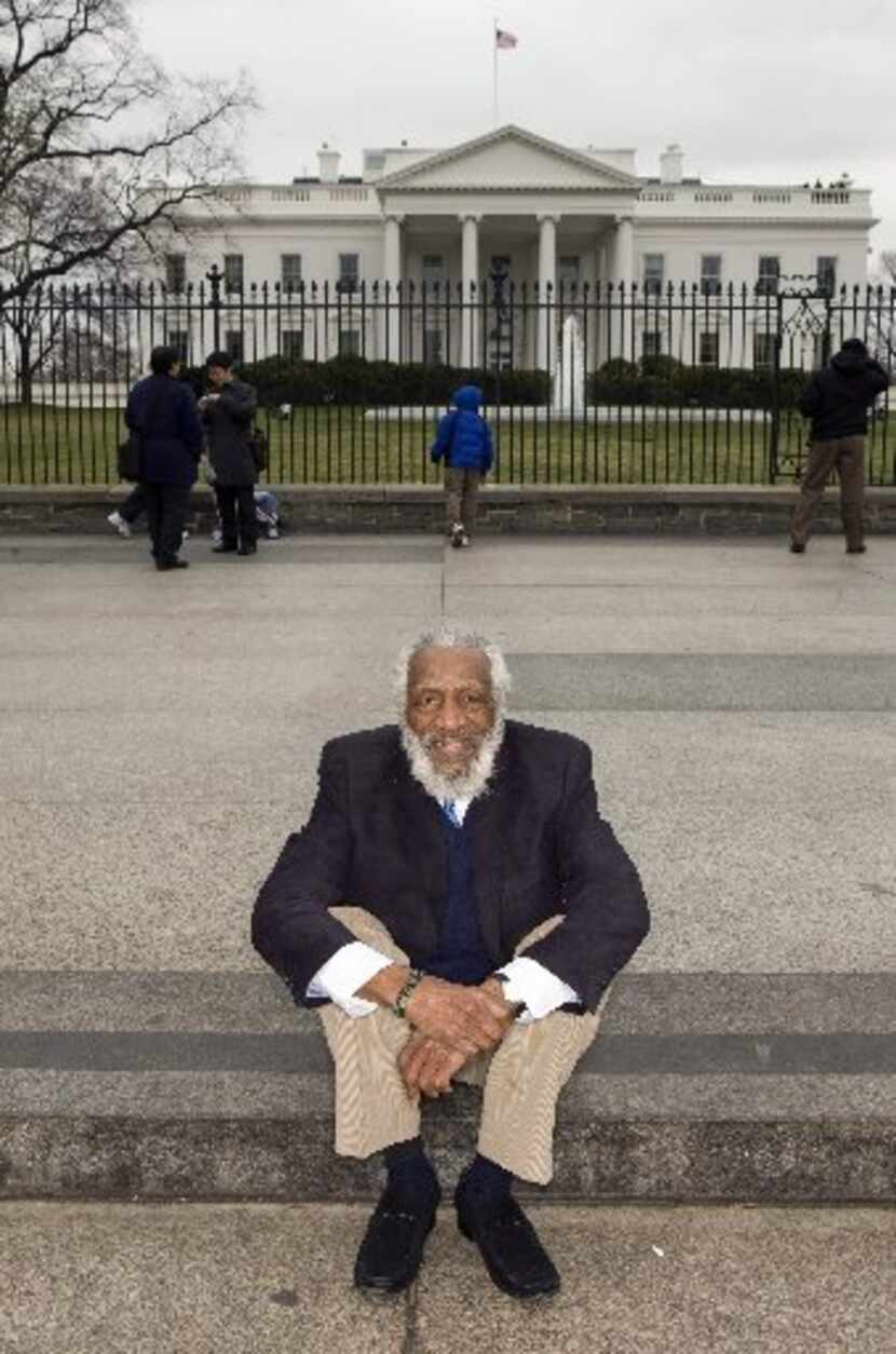 Comedian, civil rights activist and health food advocate Dick Gregory, shown outside the...