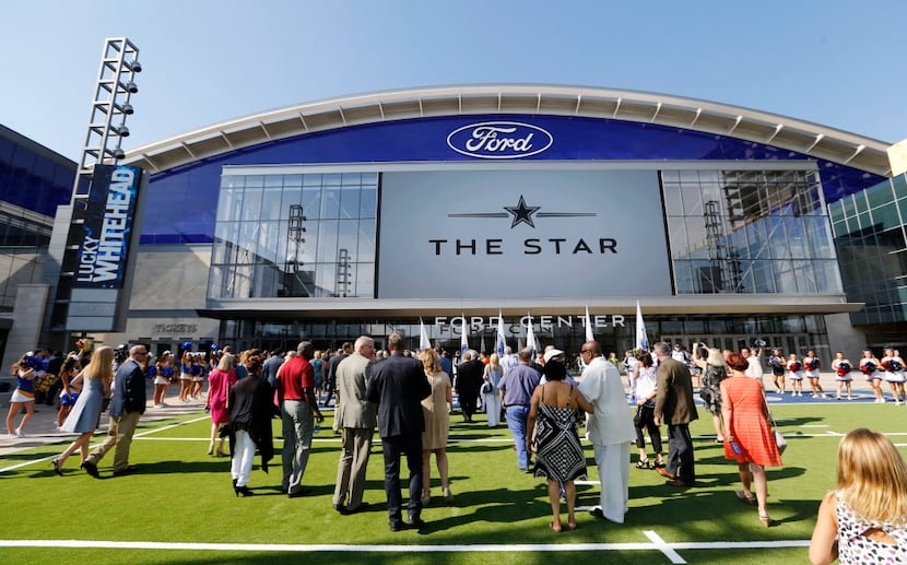 People make their way inside The Star, the Dallas Cowboys new headquarters at The Star in...