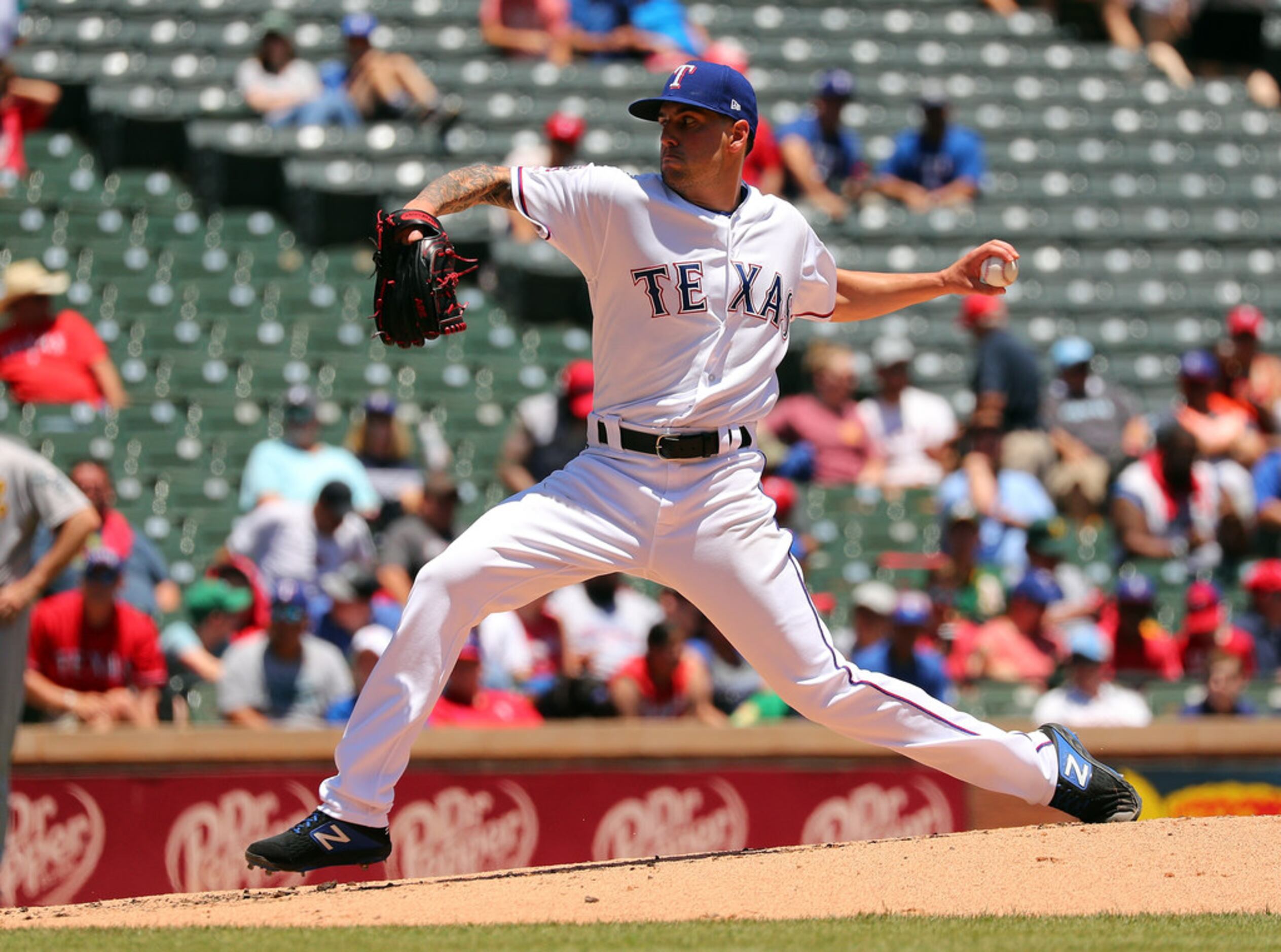 Texas Rangers beat Oakland A's in doubleheader opener