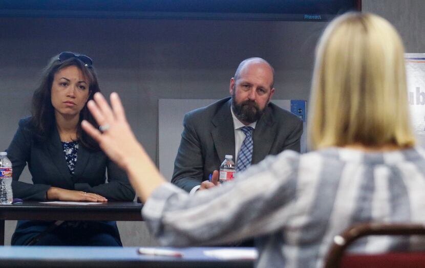 Penny Schwinn, left, the Texas Education Agency's chief deputy commissioner of academics, is...