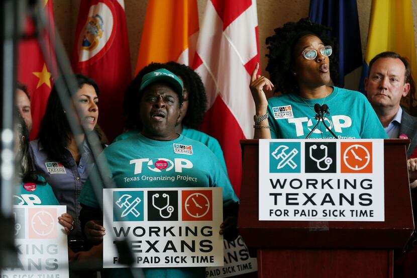 Brianna Brown  of the Texas Organizing Project spoke during a press conference with the...