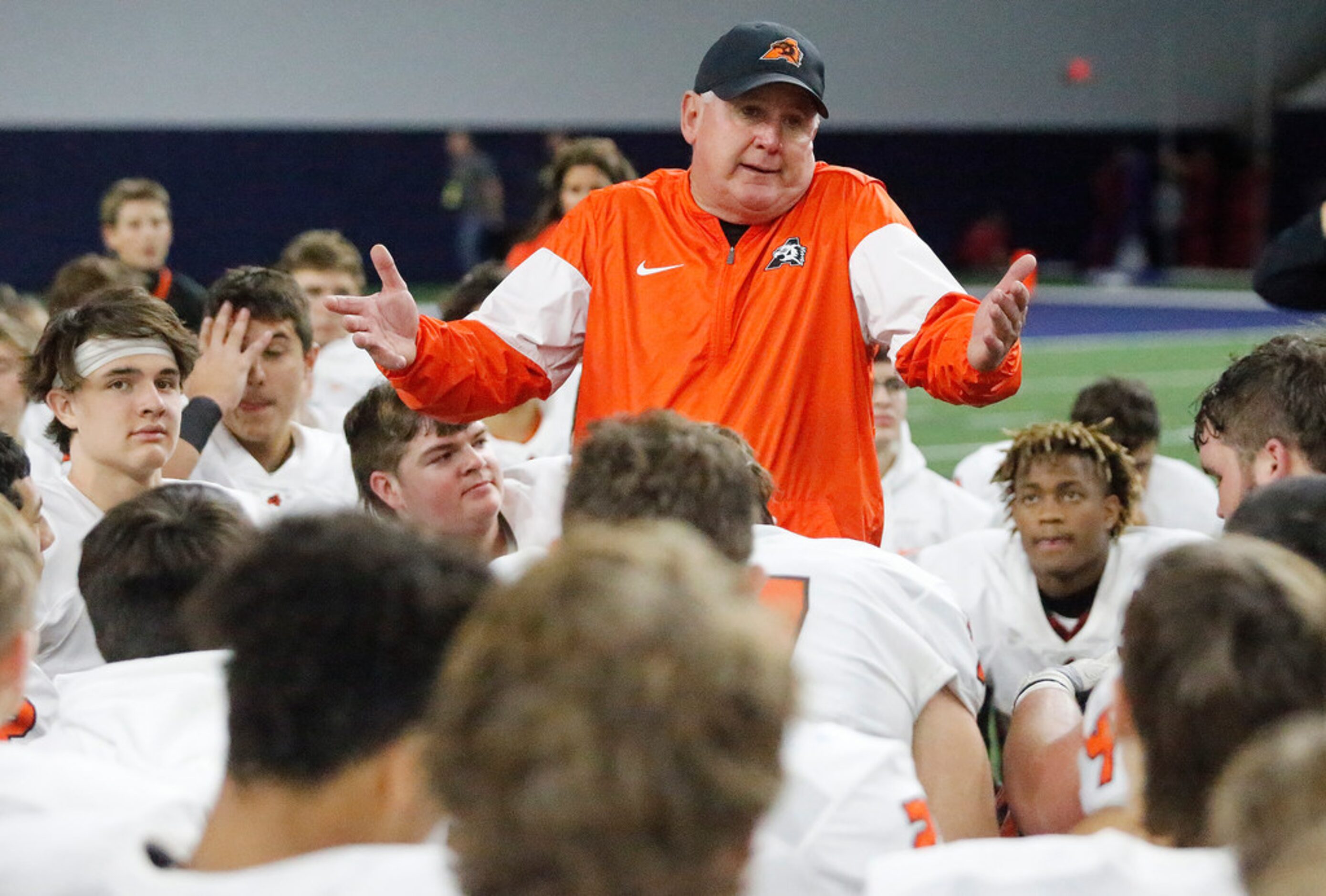 Aledo High School head football coach Steve Wood addresses his team after their victory over...