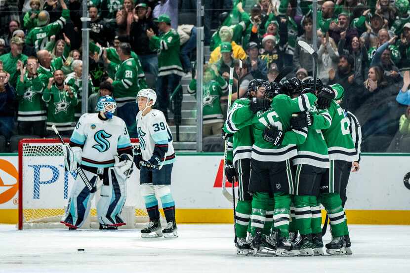 The Dallas Stars celebrate after center Matt Duchene's second goal of an NHL hockey game in...