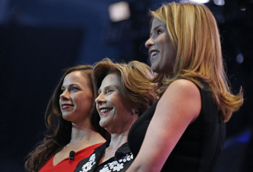 Former First Lady Laura Bush (center) wrote the intro to Sisters First: Stories from Our...