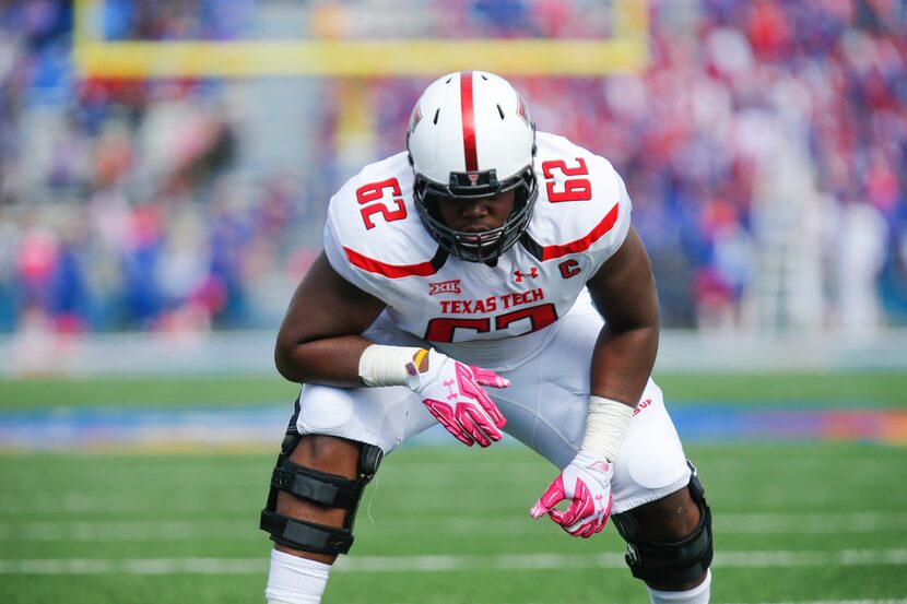 LAWRENCE, KS - OCTOBER 17: Le'Raven Clark #62 of the Texas Tech Red Raiders prepares for the...