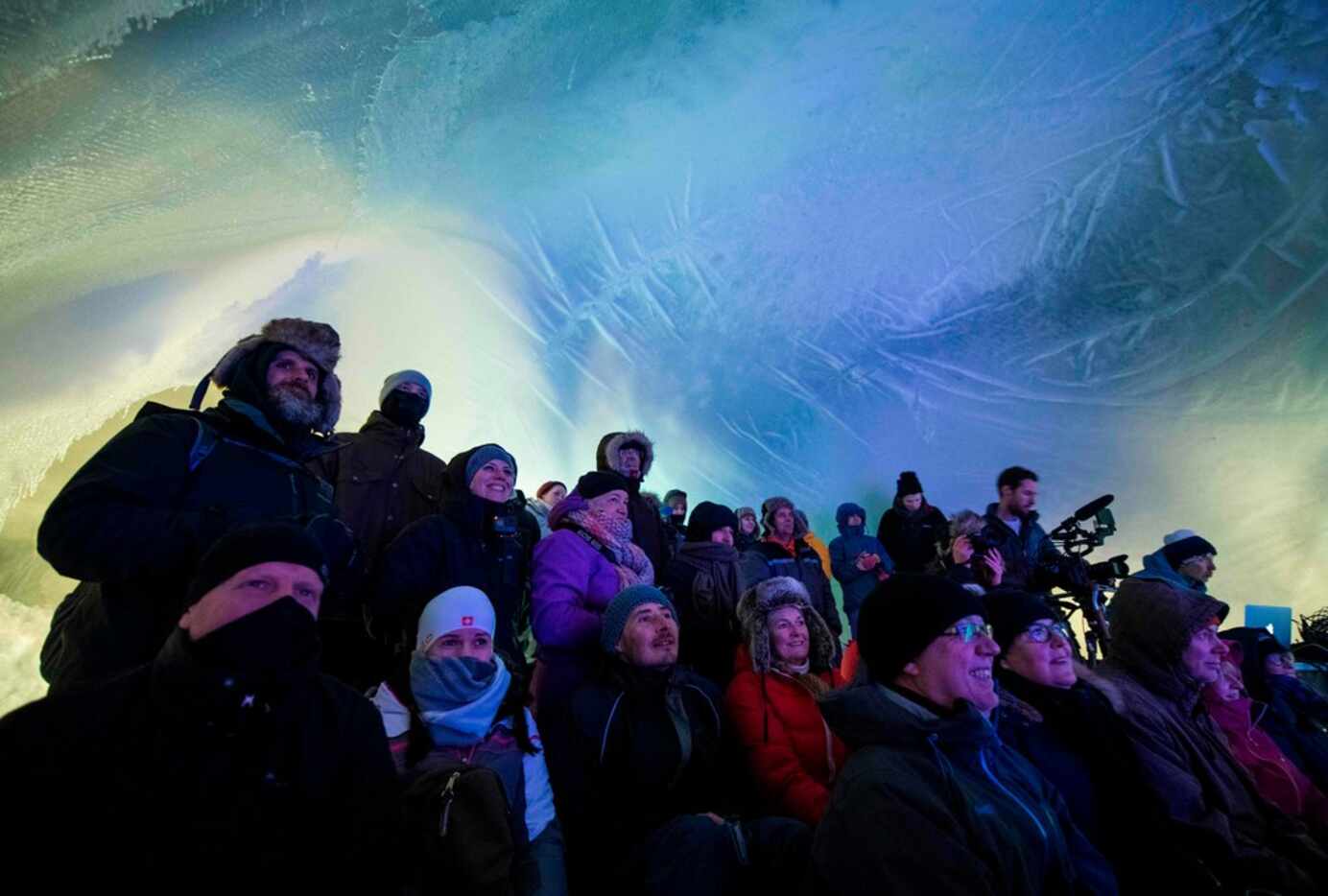 People attend the Ice Music Festival on Feb. 2, 2018 in the small mountain village of Finse...
