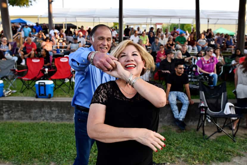 Irma and Leonard Naranjo dance to the music of Havana NRG at the 2017 Latino Heritage...