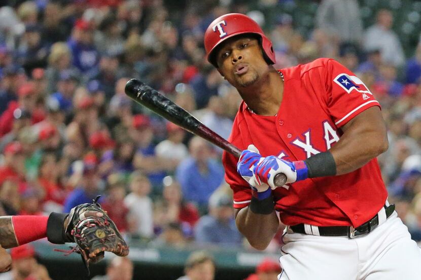 Texas Rangers third baseman Adrian Beltre (29) takes a pitch in the second inning during the...