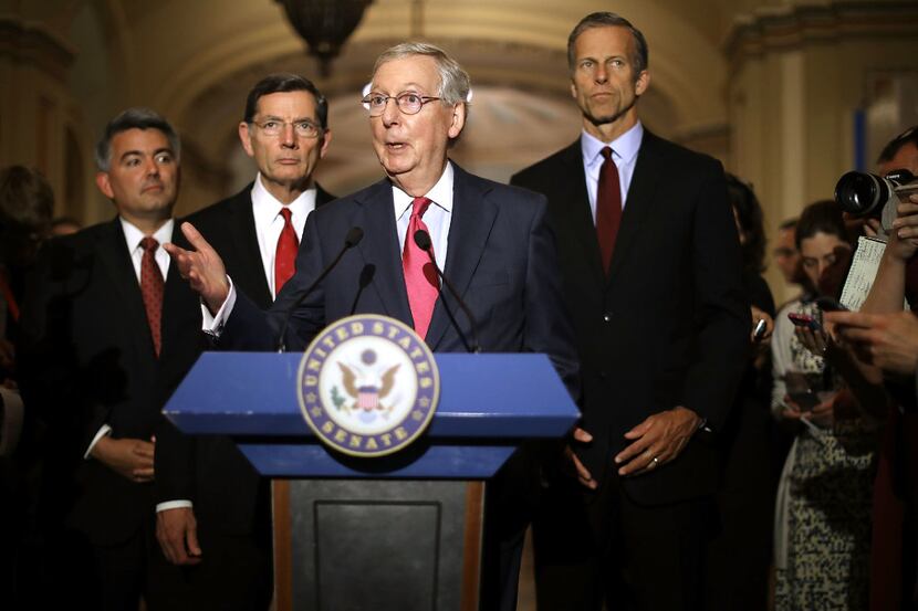WASHINGTON, DC - MAY 16:  Senate Majority Leader Mitch McConnell (R-KY) (C) talks to...