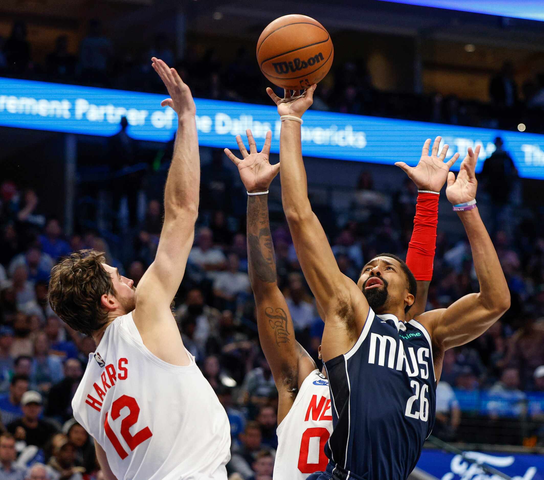 Dallas Mavericks guard Spencer Dinwiddie (26) shoots the ball against a defending Brooklyn...