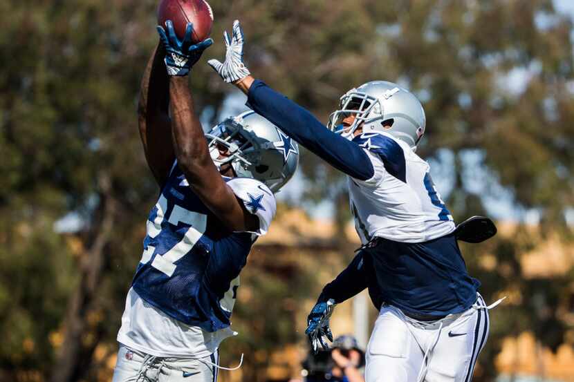 Dallas Cowboys cornerback Jourdan Lewis (27) intercepts a pass intended for wide receiver...