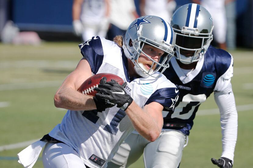 Dallas Cowboys wide receiver Cole Beasley (11) runs up the field as Dallas Cowboys...