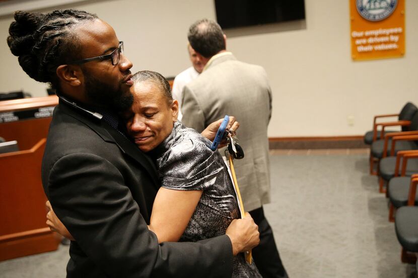 McKinney city councilman La'Shadion Shemwell hugged his mother, Rolanda Mocharia, after a...