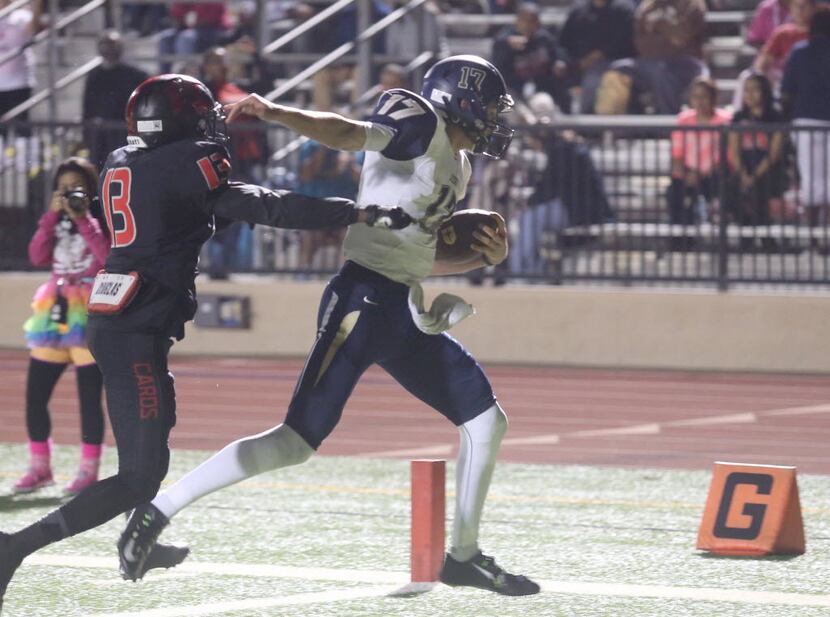 Irving MacArthur’s Rashad Fisher (13) misses Jesuit’s Jacob Palisch’s (17) touchdown during...