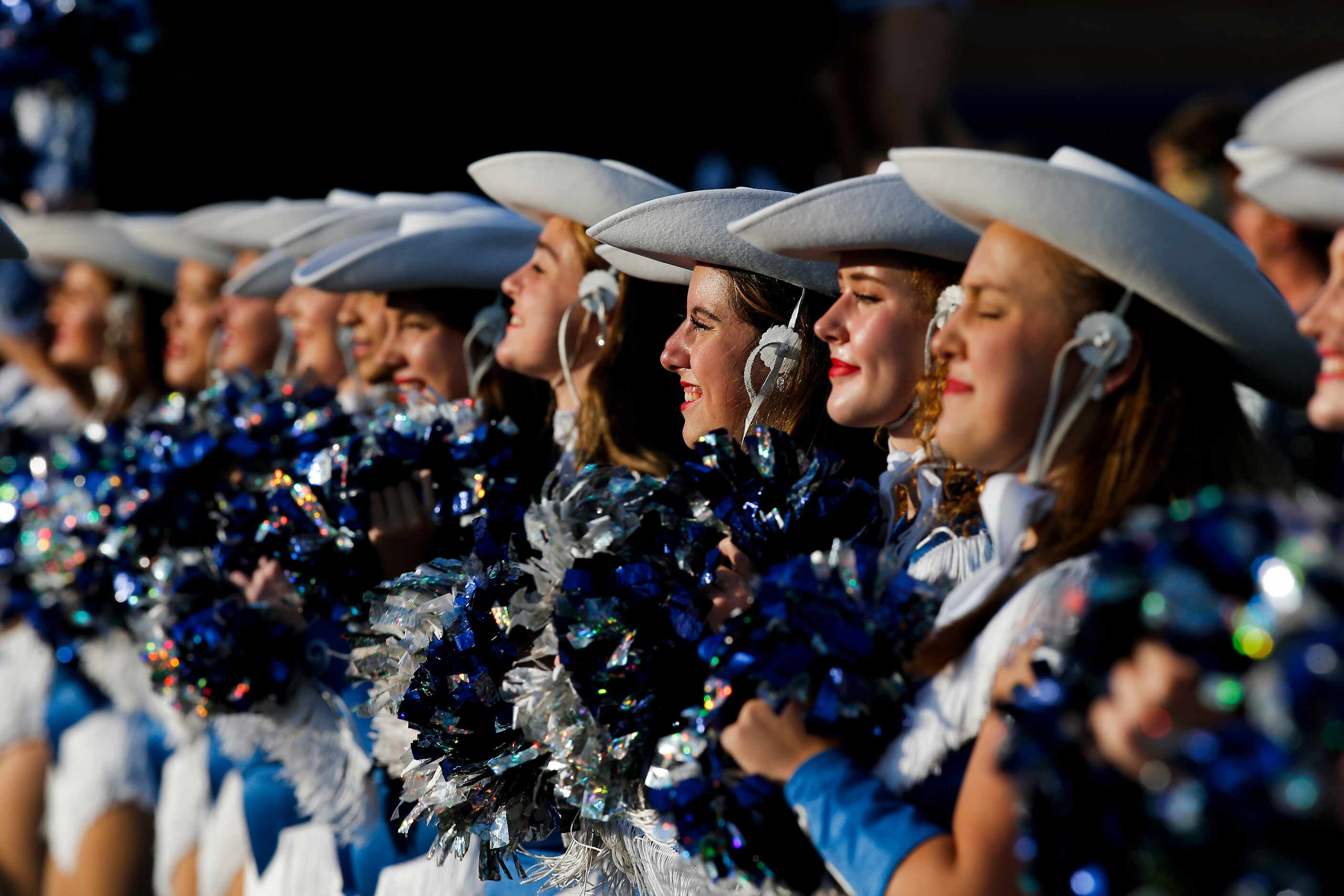 Flower Mound’s Rosettes perform before the first half of a high school football game against...