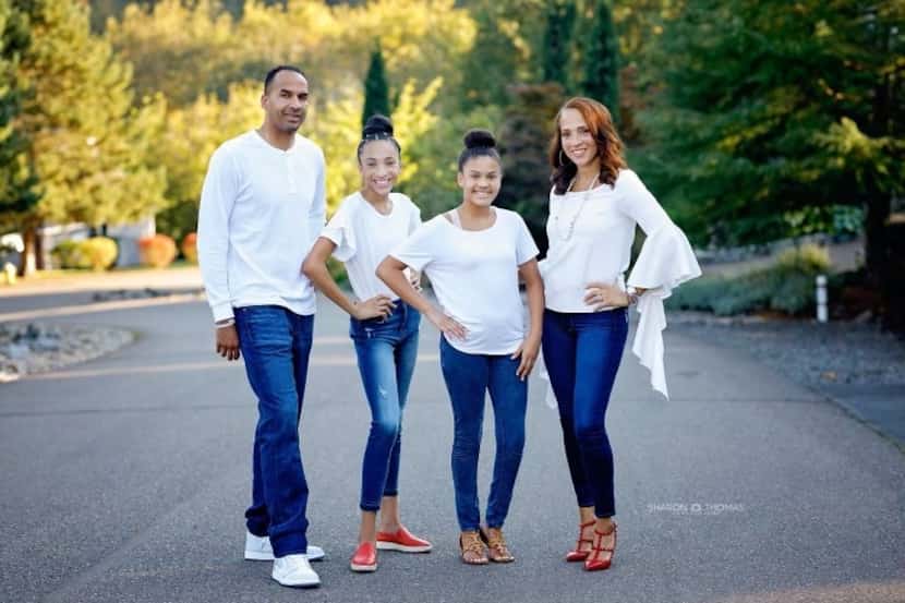 The Harrison family — Nico, Nia, Noelle and Darlise — poses for a portrait.