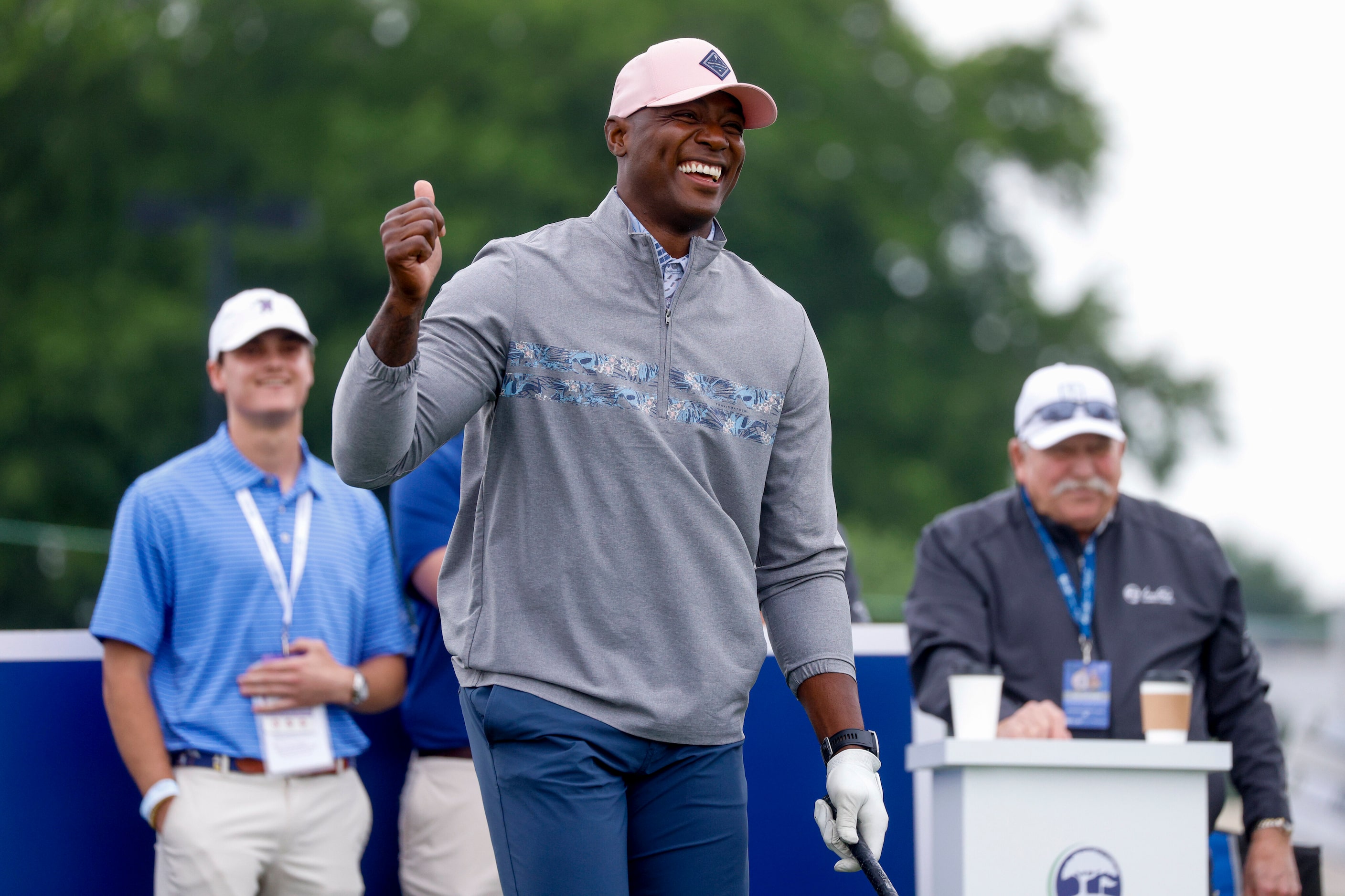 Former Dallas Cowboys player DeMarcus Ware laughs after being introduced as a contestant on...