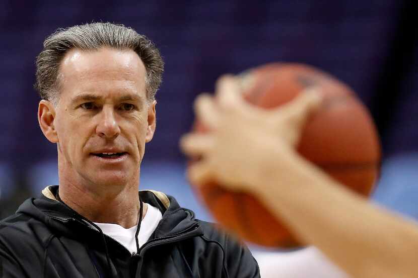 FILE - In this March 17, 2016 file photo, Pittsburgh head coach Jamie Dixon watches practice...