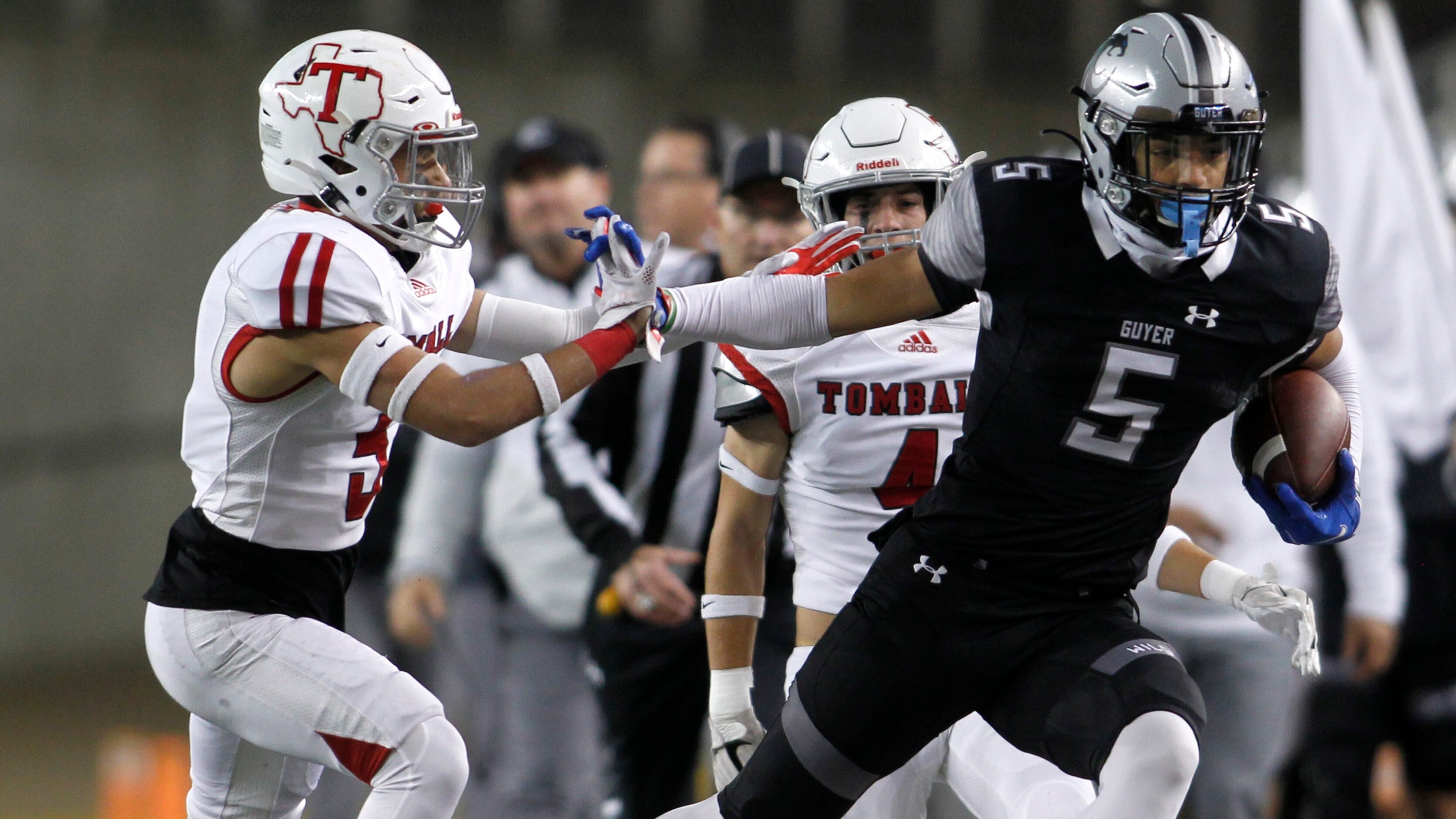 Denton Guyer receiver Jace Wilson (5) tacks on first down yardage following a first quarter...