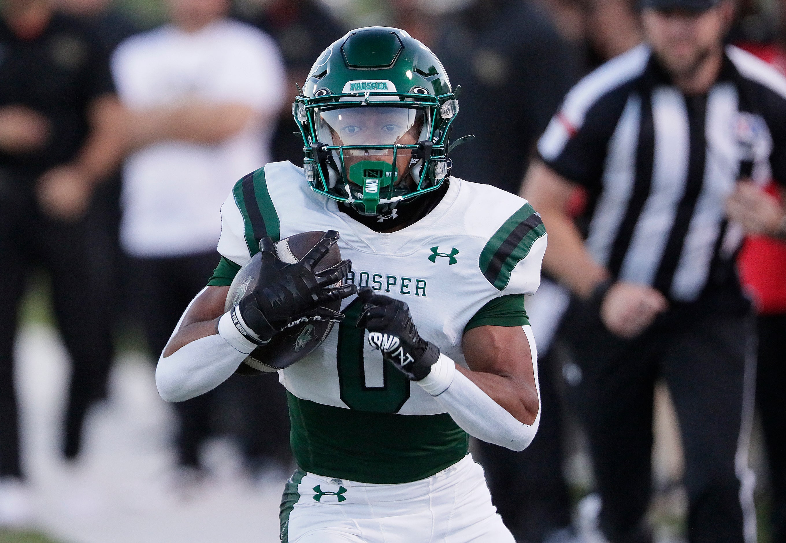 Prosper High School running back Leo Anguiano (0) runs for a touchdown on the opening drive...